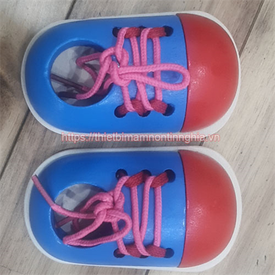 Khâu đôi giảy màu xanh 1